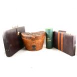 A brown leather top hat case, an Ede & Ravenscroft Panama hat, a backgammon set and a briefcase.