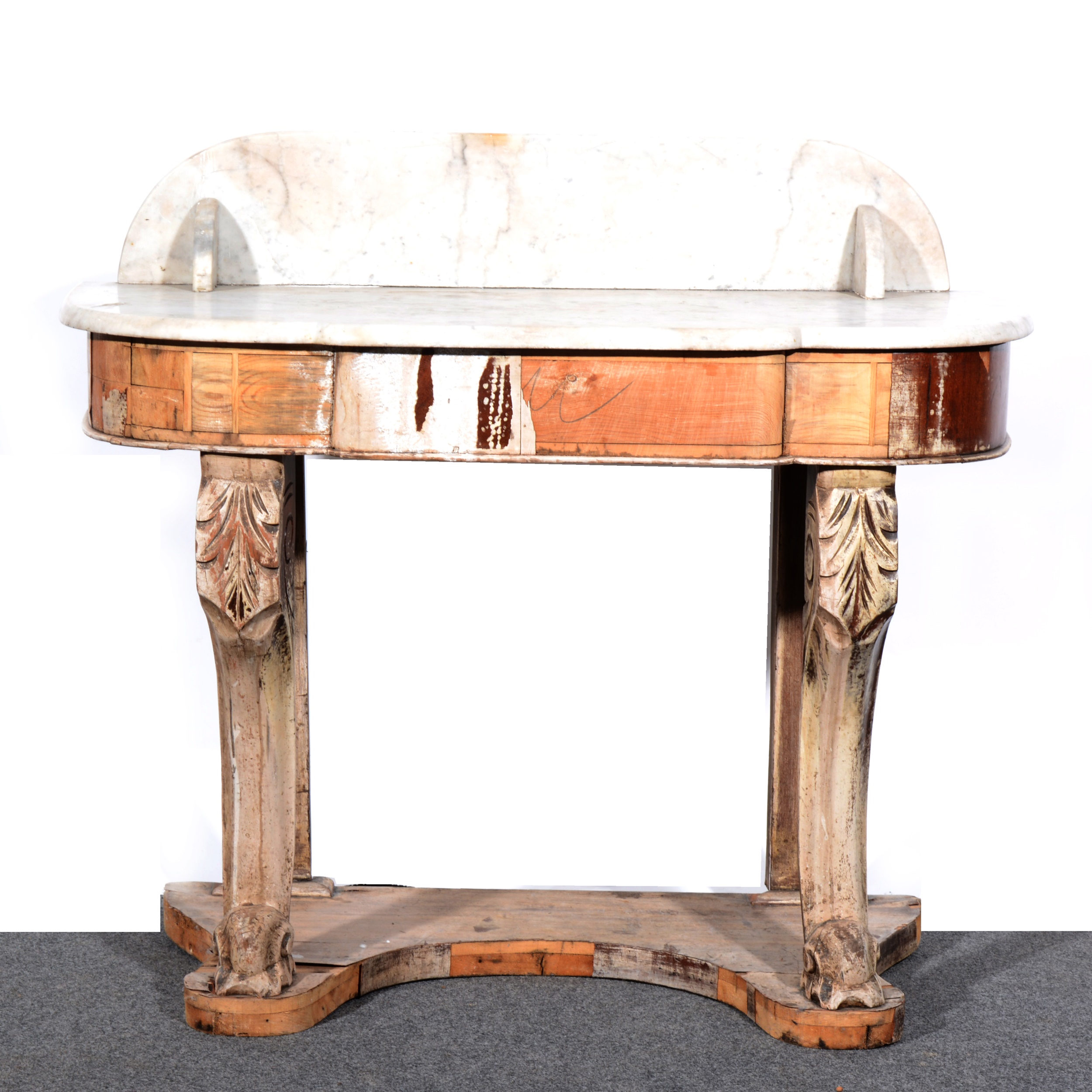 A marble-topped console table, as found