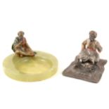 A Bergman style cold painted bronze seated figure on green marble ashtray and lead based ashtray.