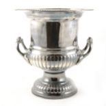 A silver-plated wine cooler.