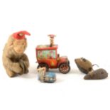 A clockwork fur bodied Chimpanzee with cymbals, a Schuco clockwork mouse, a tinplate Circus car
