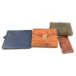 A collection of Art Deco clutch bags, vintage wallets and bill folds, writing case.