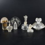 A collection of glass scent and perfume bottles, including post-1945 Lalique