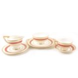 Royal Doulton bone china teaset, cream and red banded, with gilt.