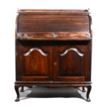 An oak cylinder top bureau