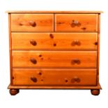 A modern pine chest of drawers