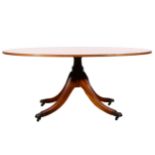 A modern low oval yew top table