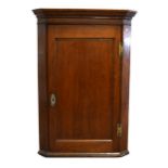 A 19th Century oak hanging corner cupboard