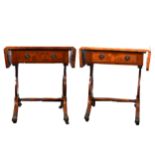 A pair of reproduction yew wood side tables