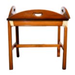 A yew wood butler's table