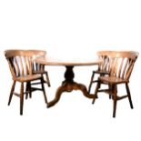 A modern pine kitchen table and six chairs