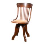 An oak swivel office chair