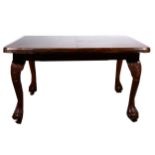 A late Victorian mahogany extending dining table