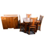 A 1940s oak dining suite