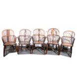 A matched set of four Victorian elm and ash Windsor chairs, and another Windsor chair