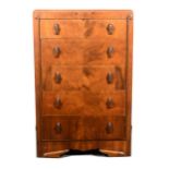 A 1930s walnut tallboy chest