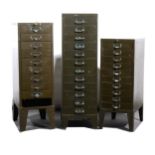 Three banks of metal file drawers