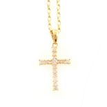 A diamond set cross and chain.