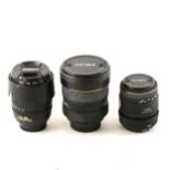 Three camera lenes; Sigma 12-24mmD wide angle lens, etc.
