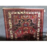 Antolian rug, central medallion within a red ground motif, multi-bordered, 180cm x 120cm.