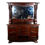 An Edwardian stained walnut sideboard, with Art Nouveau oxidised metal furnishings, mirror back