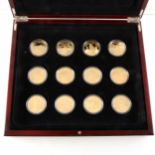 The Golden History of Powered Flight - a set of 12 silver gilt commemorative coins in fitted case.