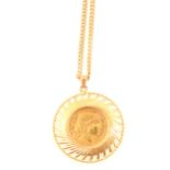 A French Gold 20 Franc Coin in pendant mount with chain.