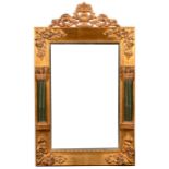 A modern wall mirror, scrolled urn pediment, the frame with Corinthian columns