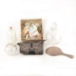 A silver half hinged bangle, silver-topped dressing table jars etc.