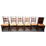 Set of six oak and ash rail and ladder back dining chairs, rush seats, pad feet, 91cm.