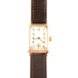 A lady's/gentleman's vintage 9 carat yellow gold wrist watch.