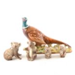 A Beswick pheasant and four koala bear figures