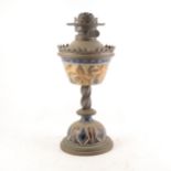 A Victorian brass and stoneware oil lamp, probably Doulton Lambeth