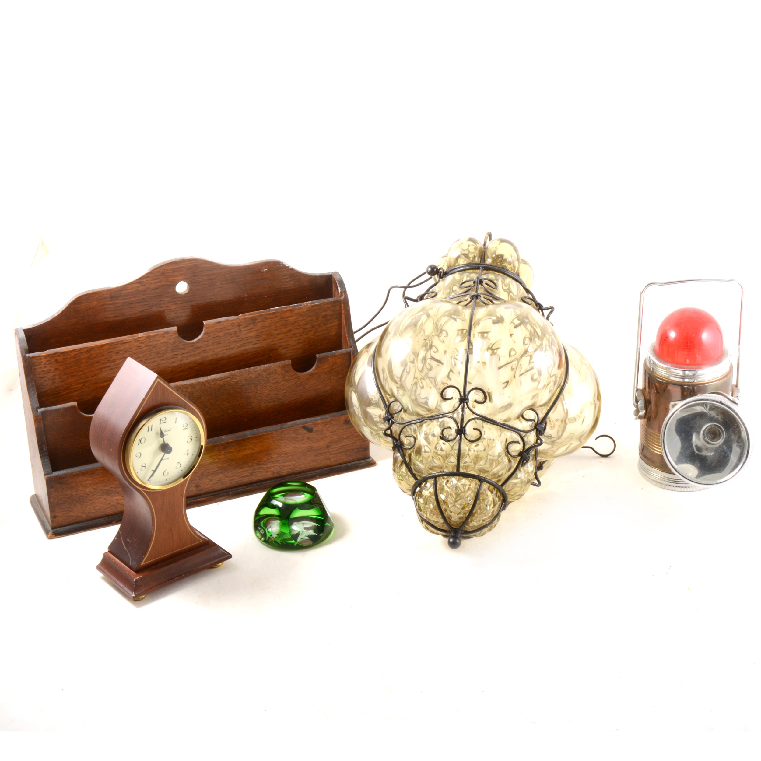 A small lancet-shape mantel clock, an oak stationery rack; glass lantern, etc