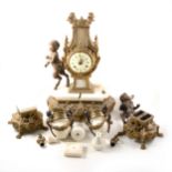 A French gilt metal and white marble clock garniture