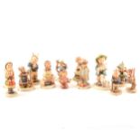 Thirteen Hummel figures