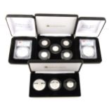 Seven cased sets of commemorative coins, issued by Jubilee Mint and Danbury Mint, etc