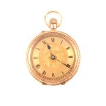 A 12 carat yellow gold open face fob watch.