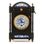 An Aesthetic movement ebonised mantel clock