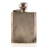 A silver hipflask by Joseph Gloster Ltd.