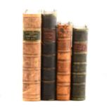 Four antiquarian books.