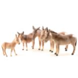 Five Beswick donkey figurines