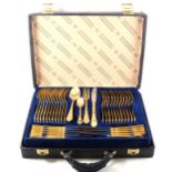 A cased SBS modern canteen of gold-plated stainless steel cutlery