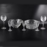 Two sets of Waterford crystal glasses, plus two glass bowls.