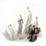 A collection of Lladro figurines, a large Nao fisherman, etc