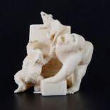 A Japanese carved ivory group, early 20th Century