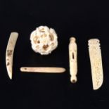 A small Cantonese carved ivory puzzle ball, a carved bone propelling pencil, etc