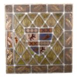 A leaded and stained glass armorial panel, and five other panels