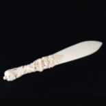 A carved ivory letter knife, probably French, late 19th century