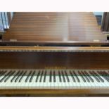 A German sapele cased baby grand piano, Schubach